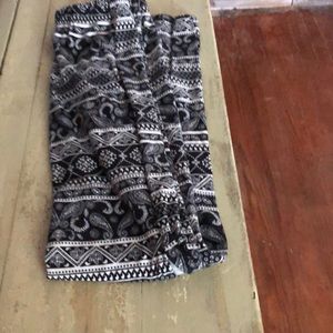 Black and white leggings with varied patterns.